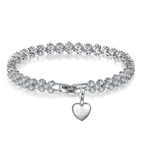 7CT SIMULATED SAPPHIRE RHODIUM PLATED MULTI LINK BRACELET WITH CHARM