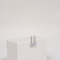 3.0 CTTW Synthetic Sapphire Clear Drop Rhodium Plated Earrings