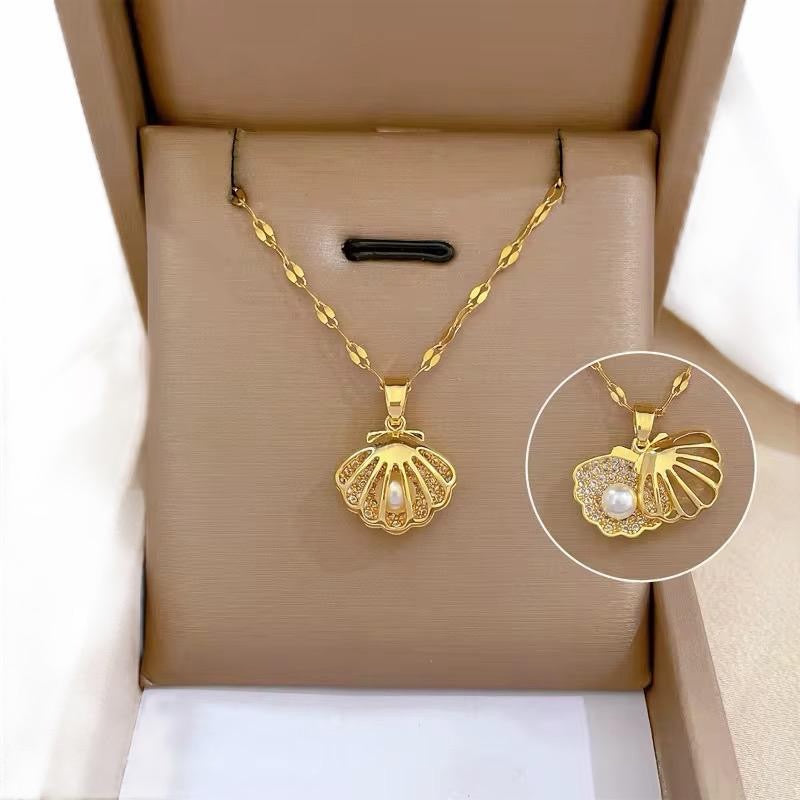 Pearl in a Gold Crystal Shell Pendant