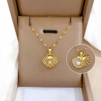 Pearl in a Gold Crystal Shell Pendant