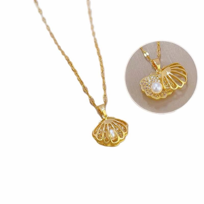 Pearl in a Gold Crystal Shell Pendant