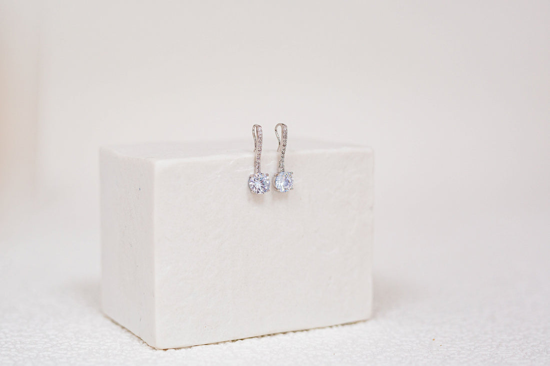 3.0 CTTW Synthetic Sapphire Clear Drop Rhodium Plated Earrings