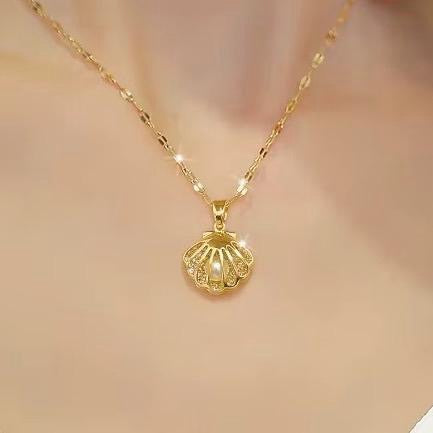 Pearl in a Gold Crystal Shell Pendant