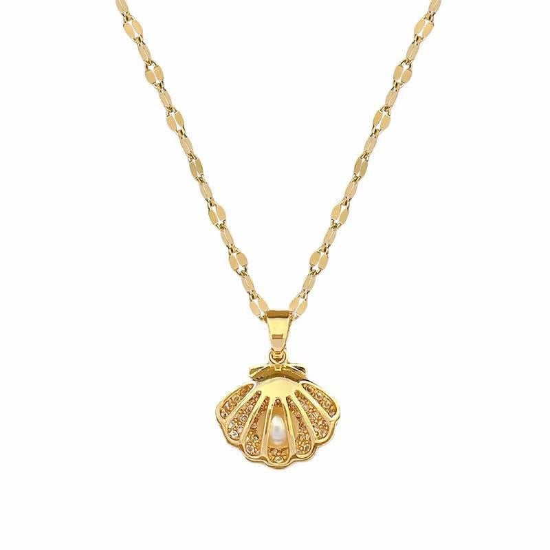 Pearl in a Gold Crystal Shell Pendant