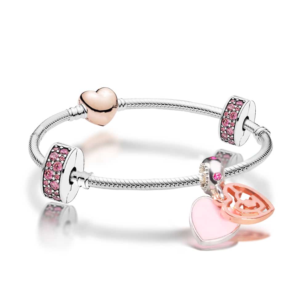 Silver and Rose Gold bracelet decorated with blush pink, rose gold and pink crystal charms