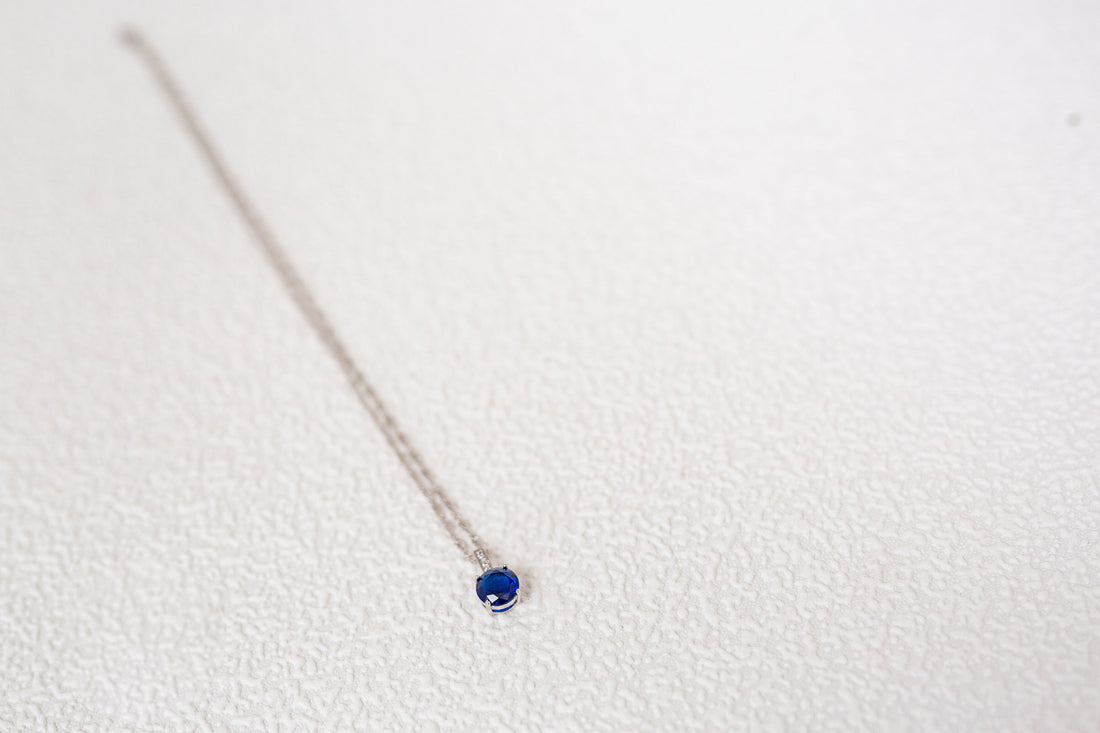 2.33 Carat Brilliant Cut Blue Lab-Created Sapphire Rhodium Plated Pendant