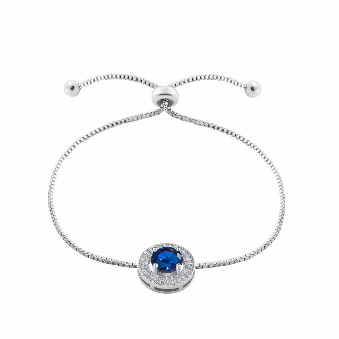 Simulated Blue Sapphire charm featuring smaller clear cut gemstones on a silver toned rhodium plated adjustable bracelet