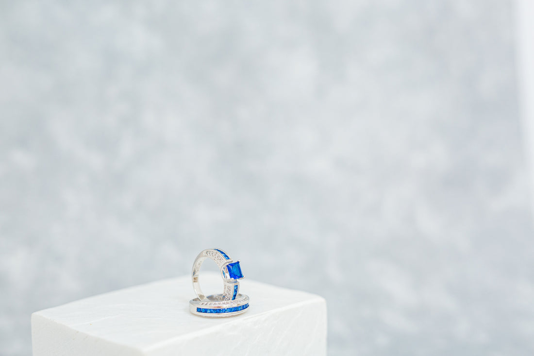 2.5 Carat Blue Simulated Sapphire Princess Cut Rhodium Plated Ring
