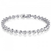 Silver toned rhodium plated bracelet featuring 29 clear cut lab made sapphires within individual chain links