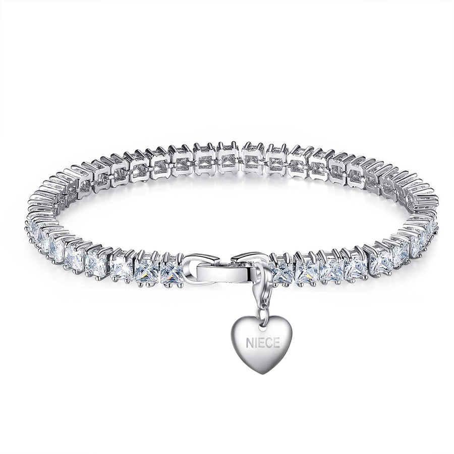 7CT SIMULATED SAPPHIRE RHODIUM PLATED TENNIS BRACELET WITH HEART CHARM