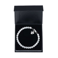 7CT BRILLIANT CUT SIMULATED SAPPHIRE RHODIUM PLATED TENNIS BRACELET WITH CHARM