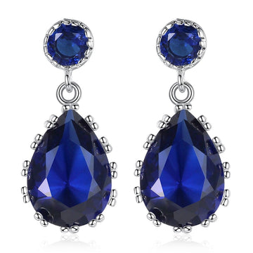 6 CARAT CREATED SAPPHIRE PEAR CUT RHODIUM PLATED EARRINGS IN BLUE OR PINK