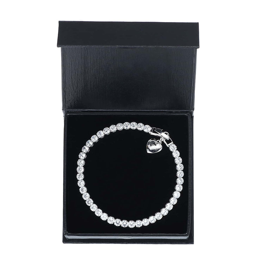 7CT SIMULATED SAPPHIRE RHODIUM PLATED SINGLE ROW BRACELET WITH CHARM