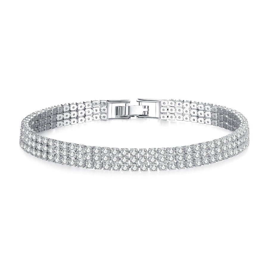 Rhodium Plated strap bracelet featuring over 220 elegant clear cut simulated sapphires, finished with a secure flat clasp