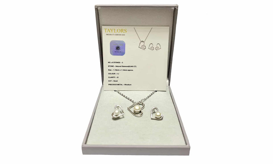 Diamond and freshwater pearl pendant & earring set cttw 0.045